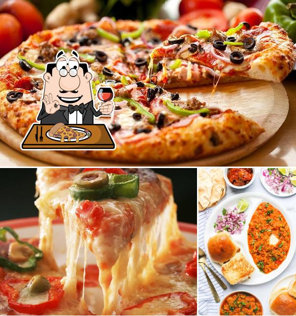 Pick pizza at Heritage bakery cafe Restaurant
