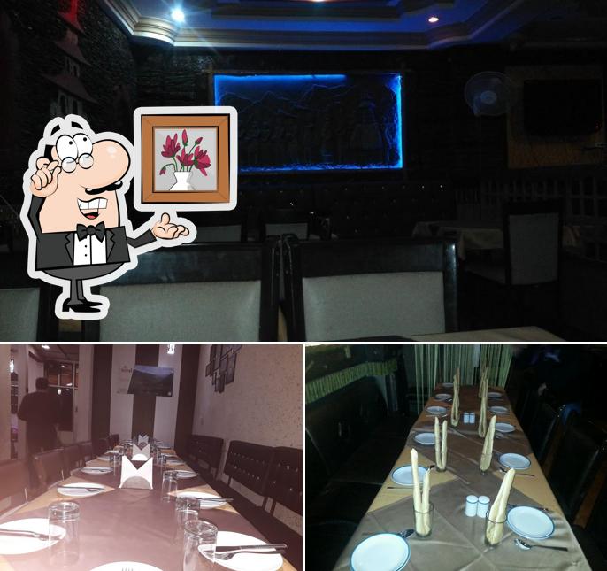 Take a seat at one of the tables at The Treat Restaurant