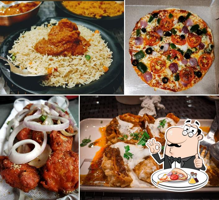 Pick pizza at FudIndia Restaurant