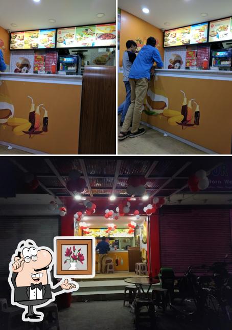 Take a seat at one of the tables at Goli Vada Pav No.1