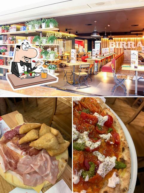 The photo of food and interior at Pollicino Cologno - Ristorante per famiglie