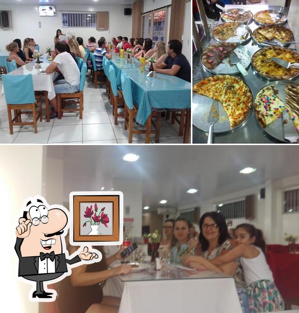 A imagem da interior e pizza a Bala's Grill Churrascaria e Pizzaria