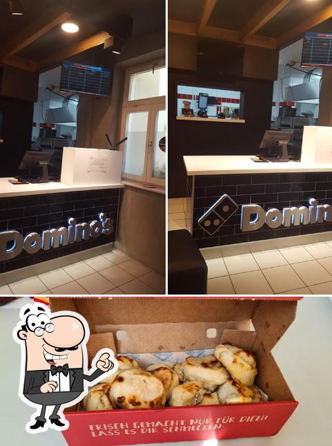 This is the image showing interior and food at Domino's Pizza Wittenberg