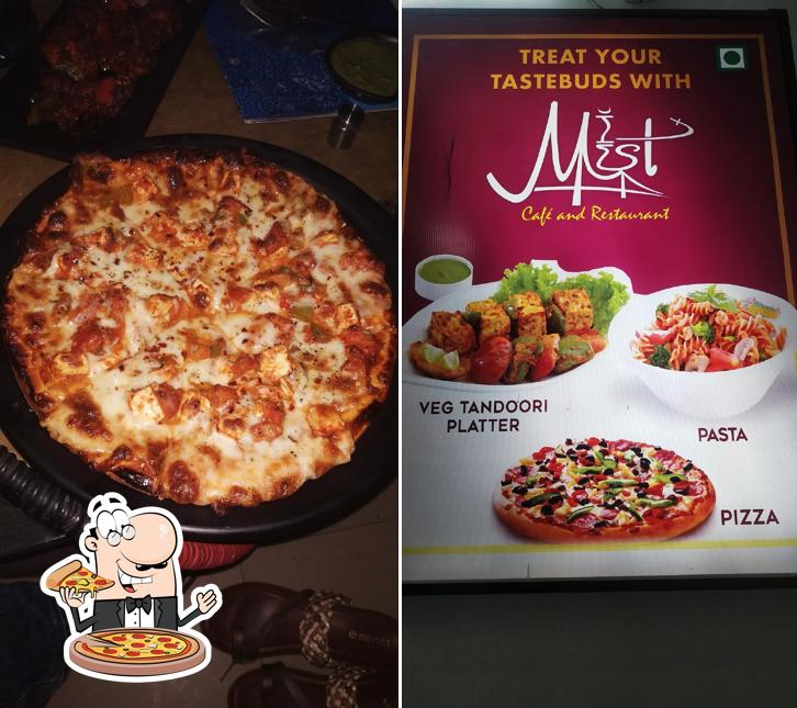 Order pizza at Mist Cafe