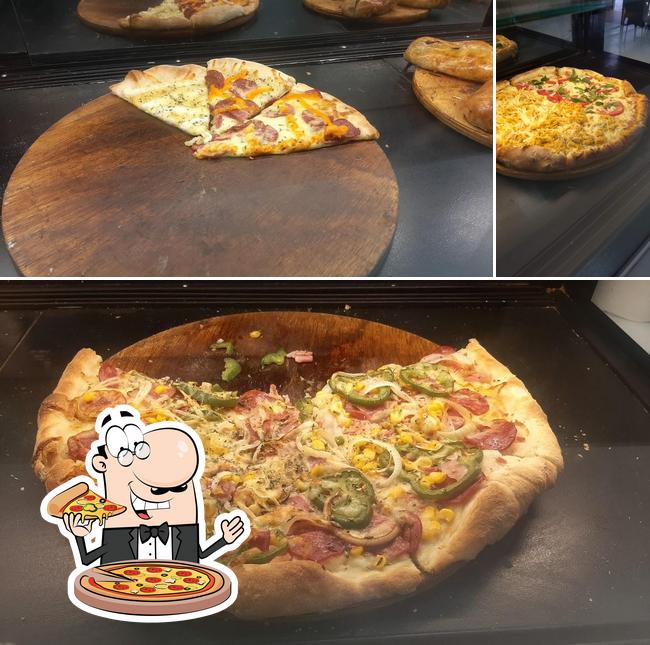 Prueba una pizza en Padaria Minas Bahia + Restaurante e Pizzaria