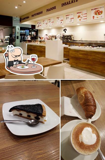 Tra le diverse cose da Grupy Caffé & Sapori si possono trovare la cibo e interni