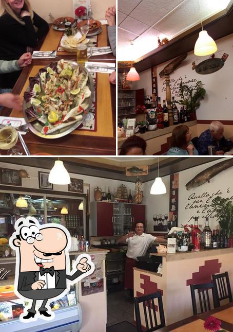 This is the photo depicting interior and dining table at Pizzeria Molise da Nicola