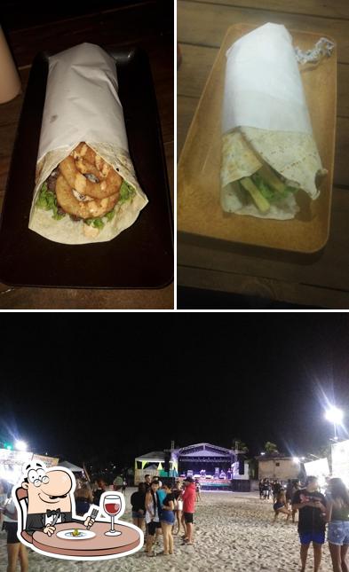 Confira a imagem mostrando comida e exterior a Grego & cia