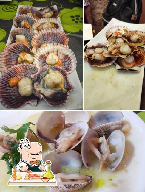 Закажите блюда с морепродуктами в "Restaurante Vinoteca Acio"