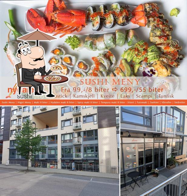 Check out the image showing exterior and seafood at Nydalen Sushi & Wok