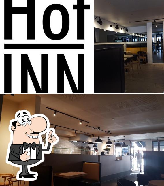 Look at the picture of Hot Inn