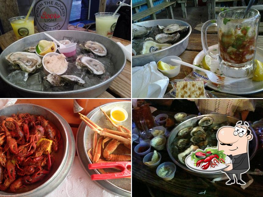 Try out various seafood dishes offered by Aw Shucks Seafood Restaurant & Oyster Bar