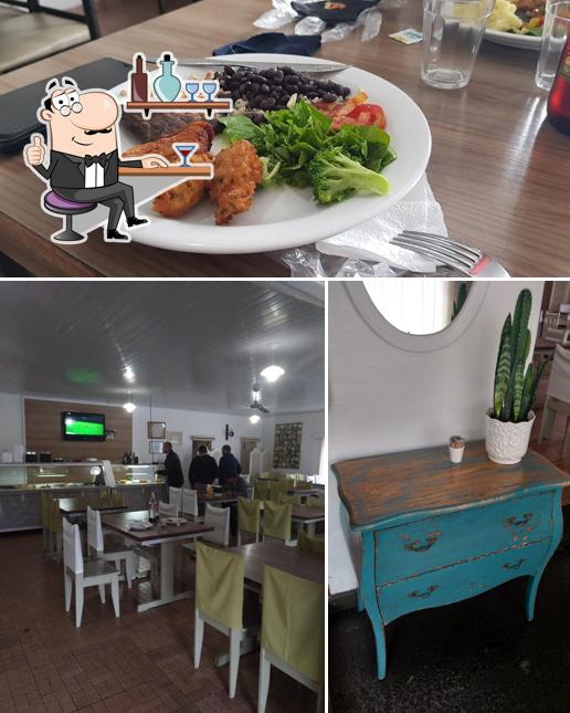 Entre diferentes coisas, interior e comida podem ser encontrados no Duca Restaurante