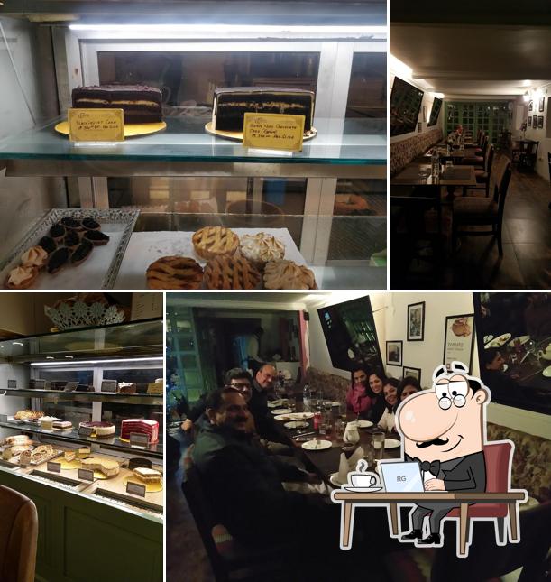 Take a seat at one of the tables at Elma's Brasserie