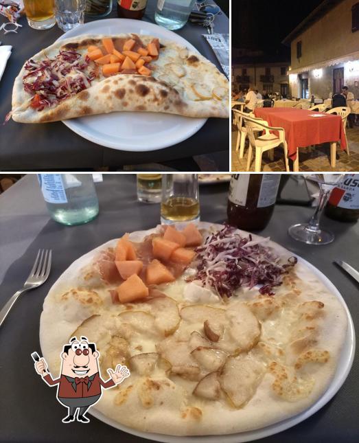 La foto della cibo e interni di Bar Pizzeria Sole