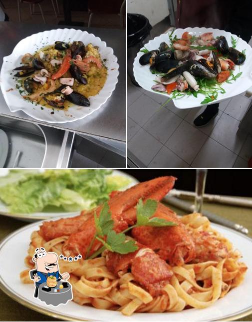 Cibo al Pesce &Bistecca ASADOR DEL MARE: Orata Isolana Pizza Scoglio Aperetivi