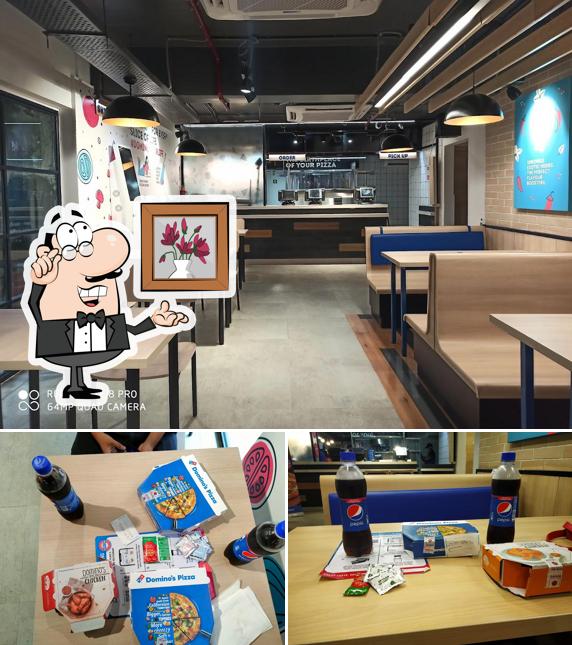 Check out how Domino's Pizza Khagra, Berhampore looks inside