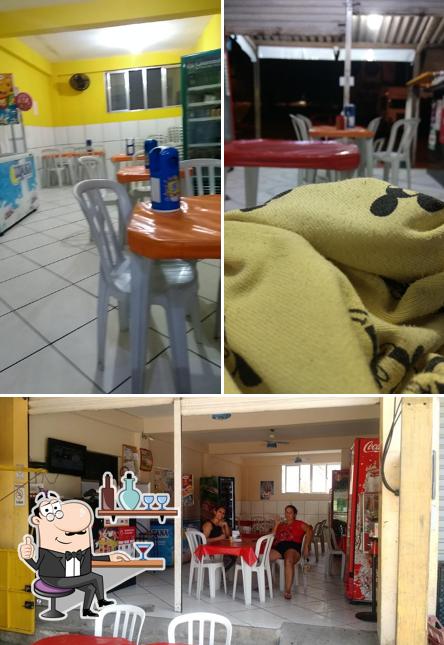 Sente em uma das mesas no Big Russo - Burguer e Lanches
