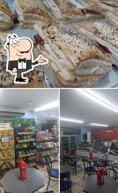 Confira a foto mostrando interior e comida no Padaria Horebe 24hs