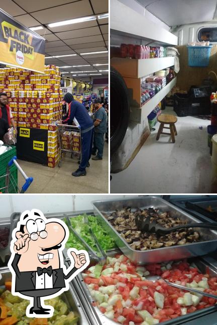 Confira a imagem mostrando interior e comida no Lopes Supermercados