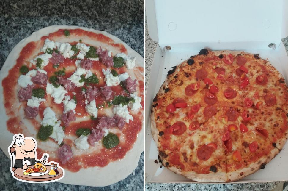 A Pizzeria d'asporto Pizza In Piazza, puoi provare una bella pizza