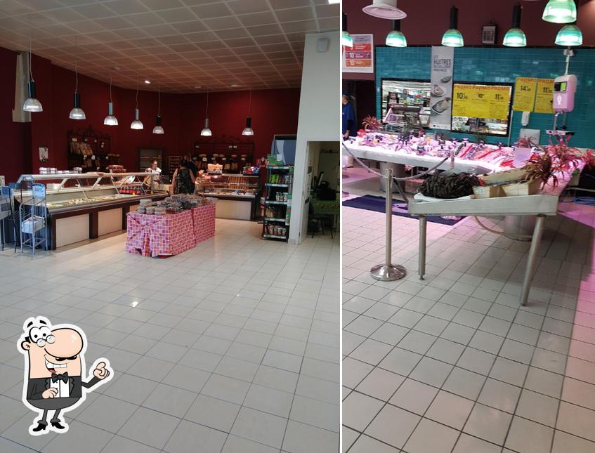 Installez-vous à l'une des tables de Intermarché SUPER Caissargues