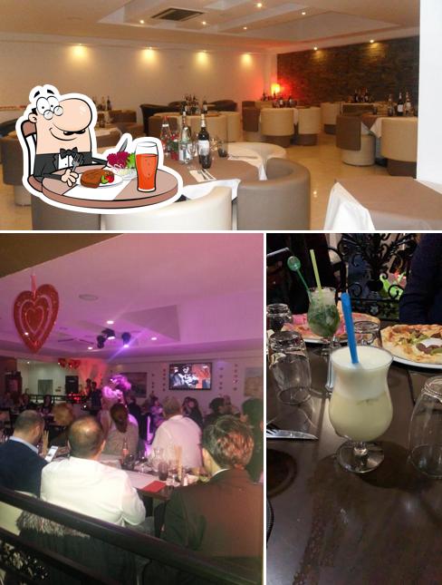 Столики и внутреннее оформление в Volcano Lounge - Restaurant Pizzeria Argenteuil