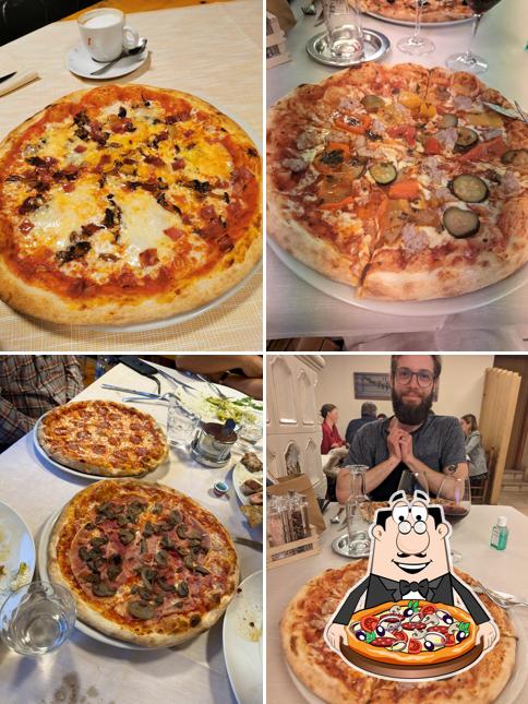 Scegli una pizza a Ristorante Pizzeria Alpino