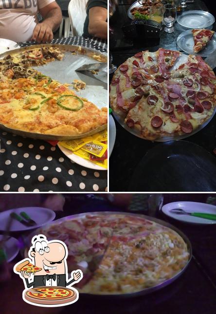 Consiga pizza no Pizzaria e Restaurante Tropitália