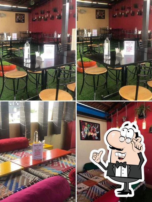 Take a seat at one of the tables at Kapoor's Cafe