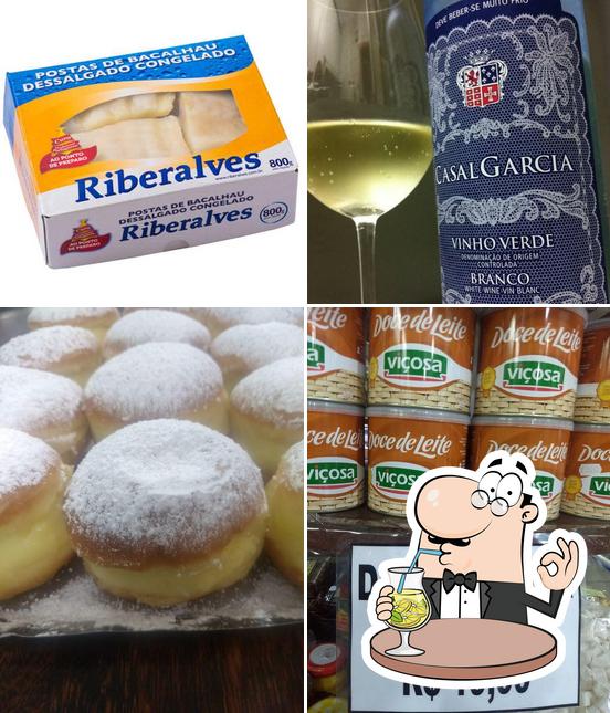 A foto do Delikatessen Padaria Sabor de Minas’s bebida e comida