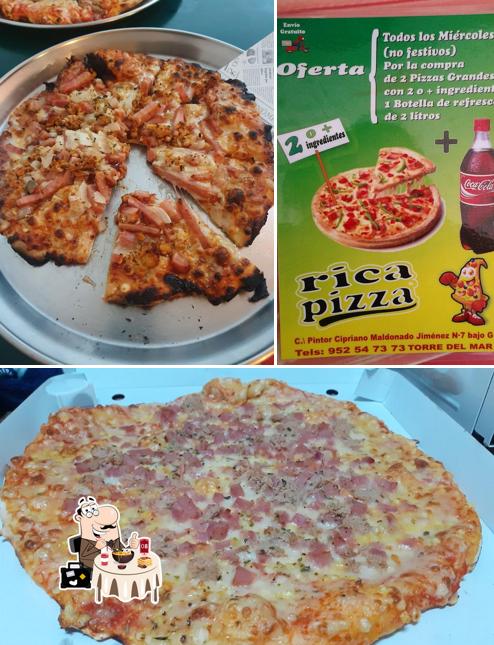 Estas son las fotos que muestran comida y bebida en Pizzería Rica Pizza