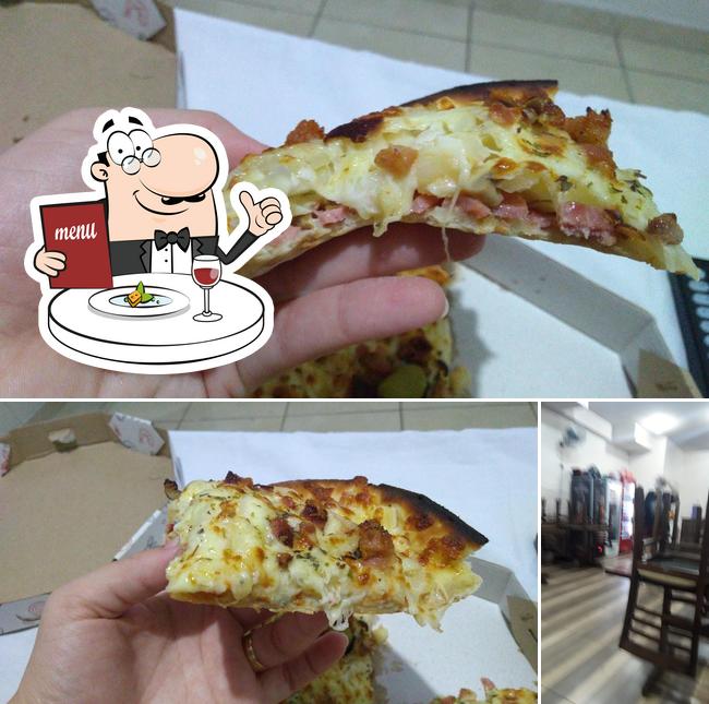 Entre diferentes coisas, comida e interior podem ser encontrados a Pizzaria La Nostra Pizza