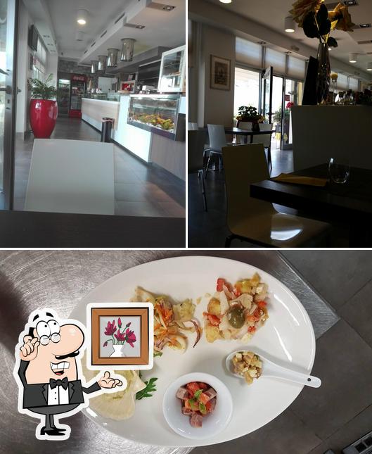Questa è la foto che presenta la interni e cibo di Ristorante Pizzeria La Saporita