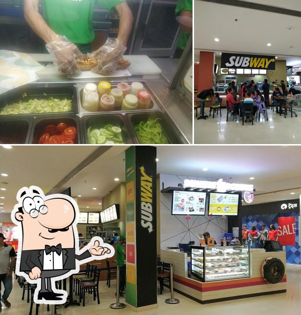 The photo of Subway’s interior and food