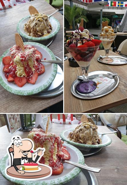 Eiscafé Minini Die Luminaden Leverkusen serviert eine Mehrzahl von Desserts 