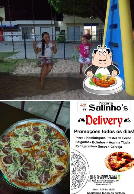 Entre diferentes coisas, comida e área de lazer podem ser encontrados no Pizzaria Salinhos