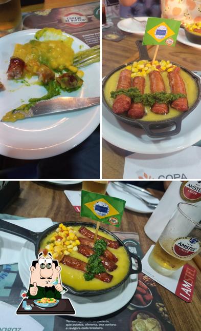 A imagem da comida e bebida no Bar do Diretor