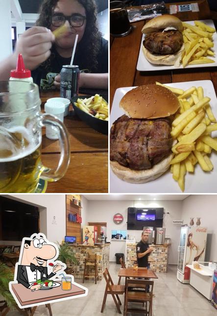 A imagem do Mahbull Burguer Centro’s comida e interior