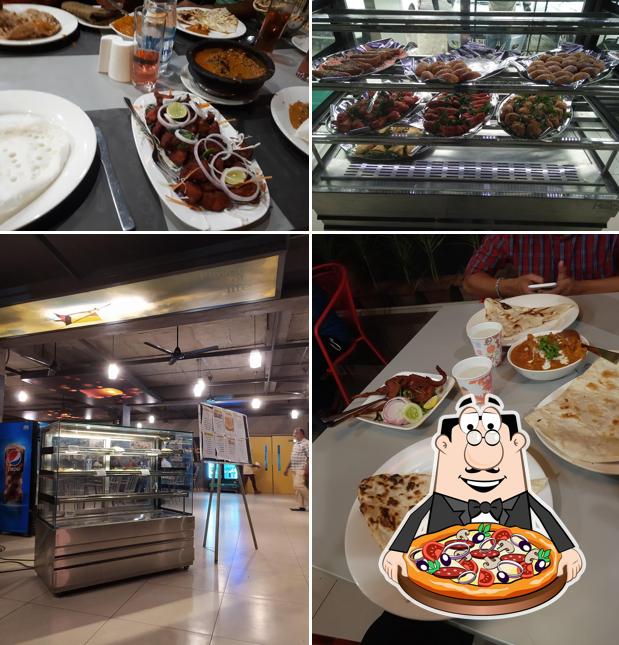 Pick pizza at Malabar Restaurant