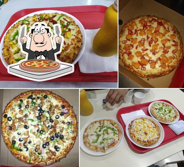 Try out pizza at DOMINIC PIZZA