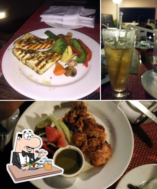 Take a look at the image displaying food and beer at Aqua Grill