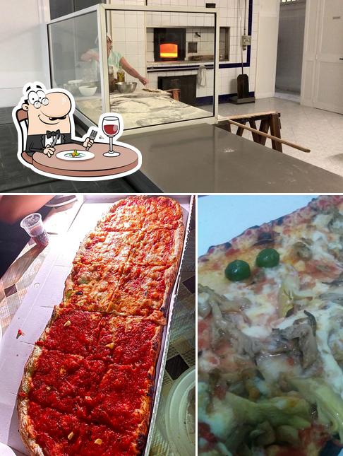 Guarda la foto che presenta la cibo e interni di Forno Pizzeria da Salvatore Ottaviano