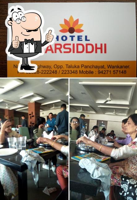 Look at the picture of Hotel Harsiddhi