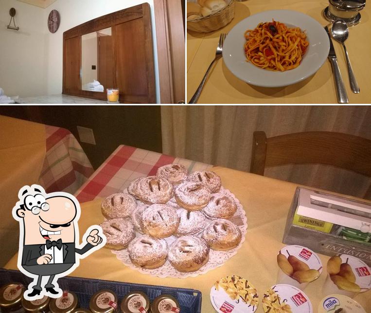 The picture of interior and food at Trattoria " Da Toi"