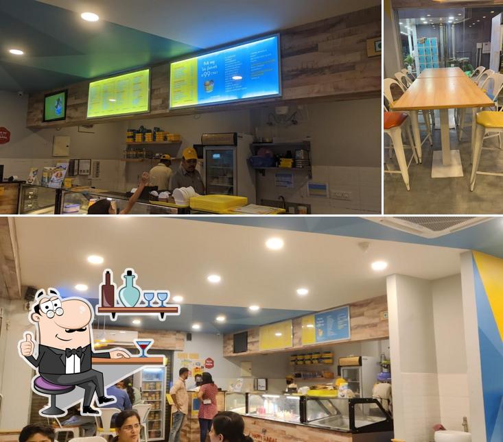 Take a seat at one of the tables at Polar Bear Ice Cream Sundaes - Seegehalli