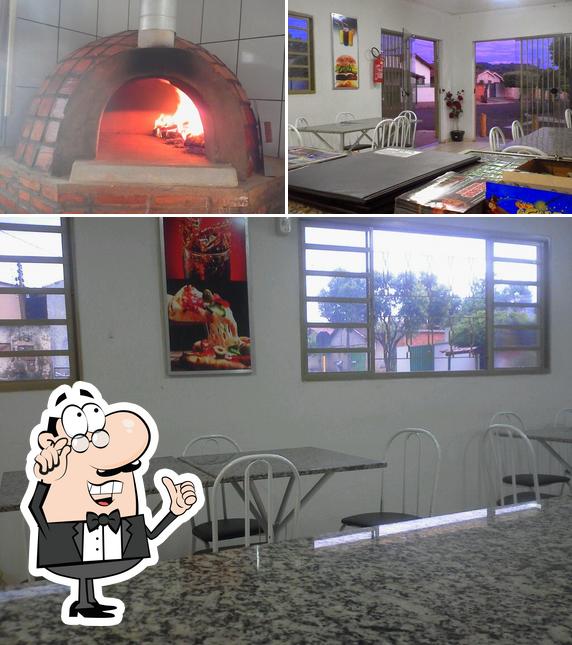 O interior do Toscana's Pizzaria e Lanchonete