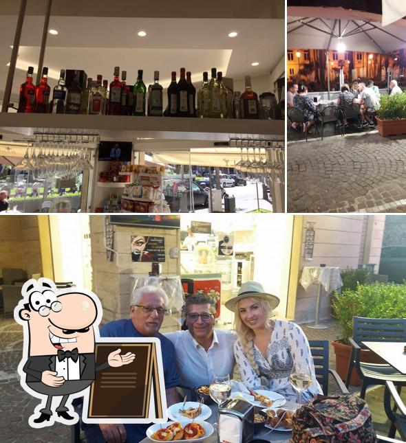 Dai un’occhiata alla foto che presenta la esterno e interni di Bar Joly