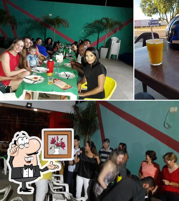 A ilustração a Tropical Sorveteria e Pizzaria’s interior e bebida