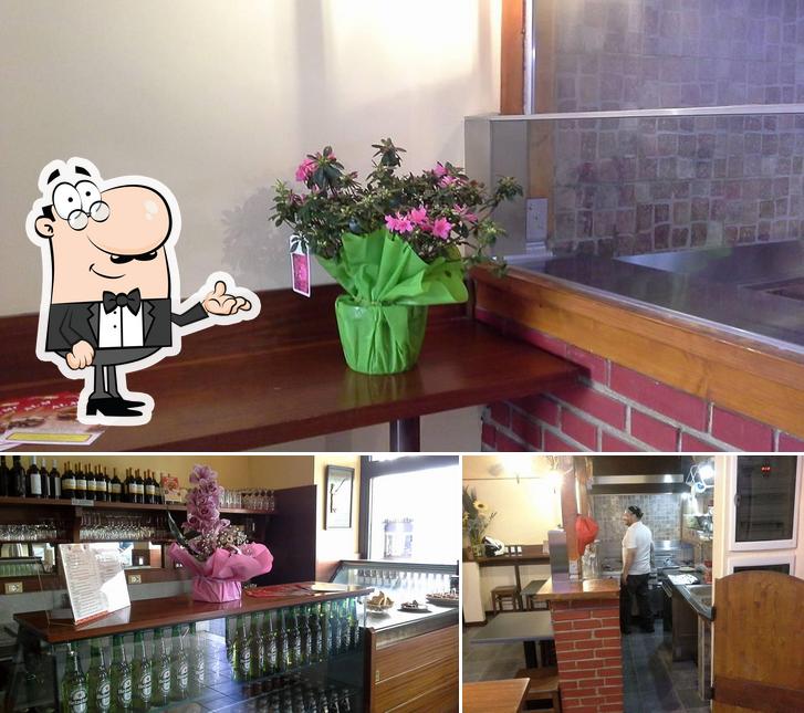 Questa è la foto che mostra la interni e vino di Al Morsigon Trieste